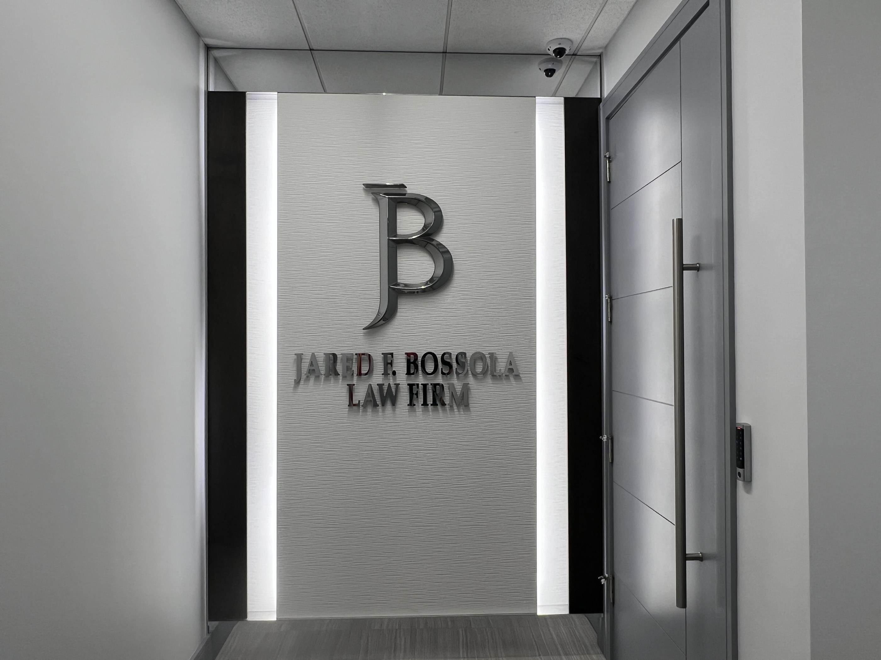 Jared F. Bossola Law Firm lobby sign